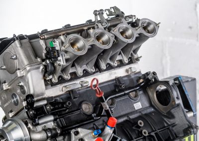 BMW S14 M3 E30 by LORRTEC dettaglio del motore: farfalle e iniezione del carburante