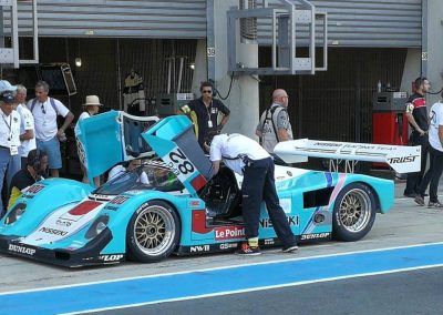 a Group C in the Spa Classic pit lane